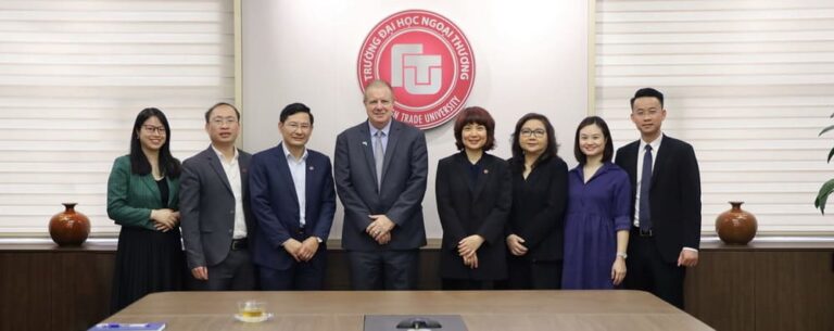 SCHOOL LEADERS WELCOME AND WORK WITH REPRESENTATIVES OF THE ASSOCIATION FOR DEVELOPING UNDERGRADUATE BUSINESS TEACHING (AACSB)